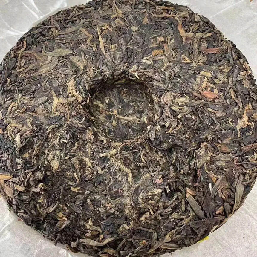 ??

2009年南糯茶王古树生，茶汤口感饱满，分布