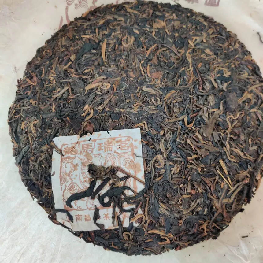 2006年云南昌泰茶叶集团，首批龙马瑞茗，干茶圆整.