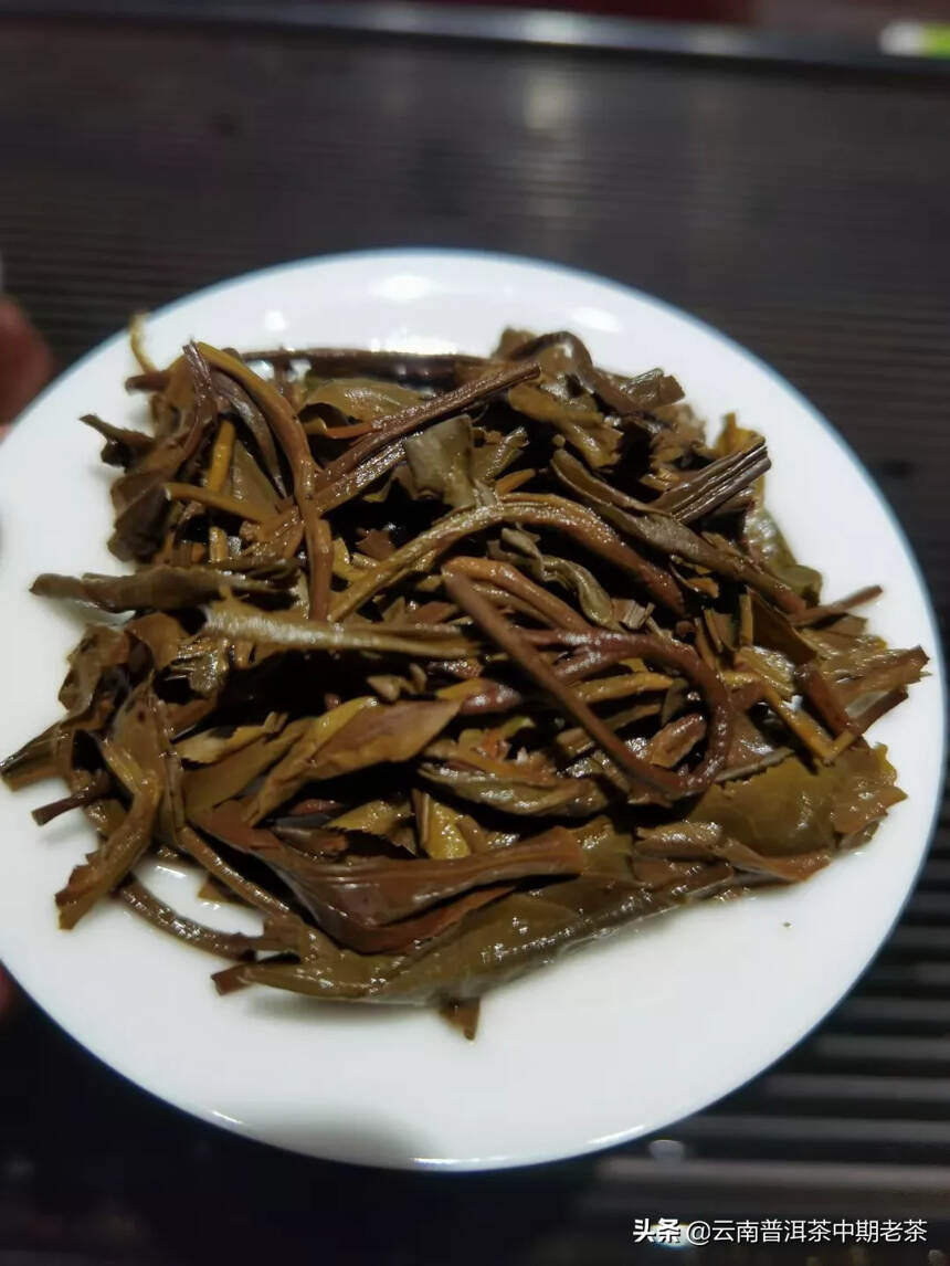 03年普洱生茶——


——瑞贡天朝，昆明干仓老生茶